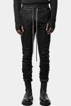 Coated anatomical fitted drawstring stretch pants