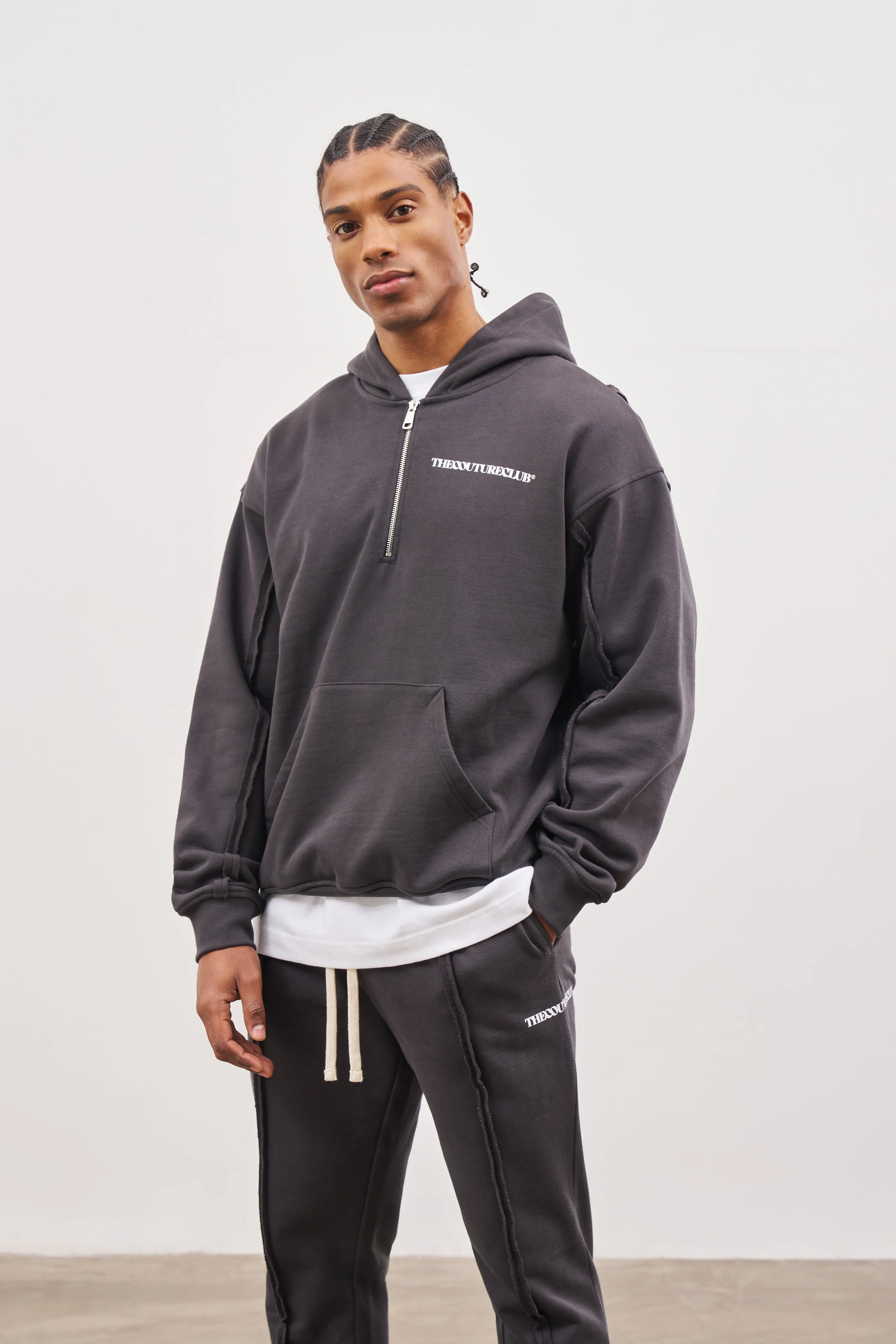 RAW SEAM QUARTER ZIP HOODIE - CHARCOAL