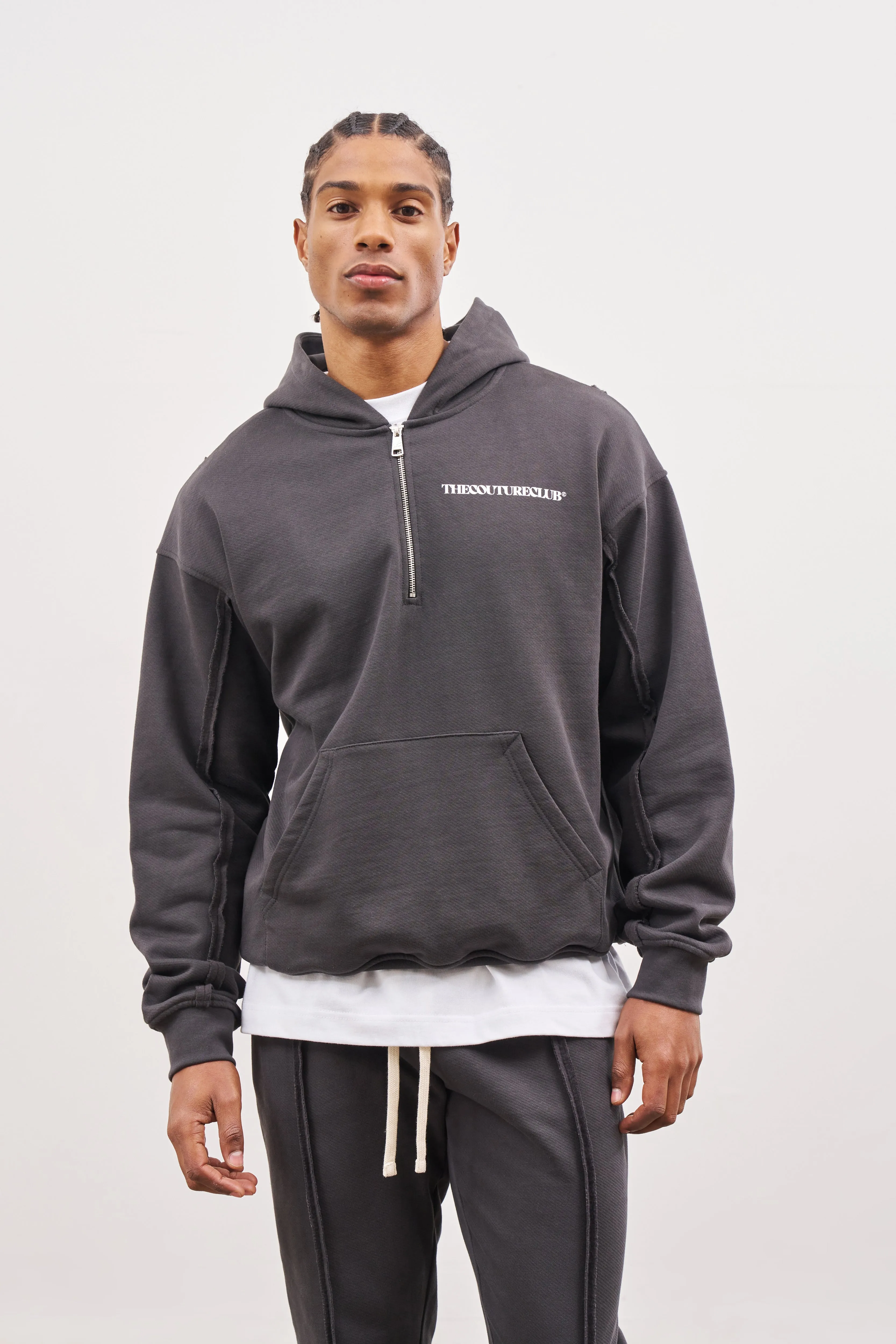 RAW SEAM QUARTER ZIP HOODIE - CHARCOAL